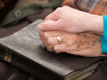 Old couple with bible